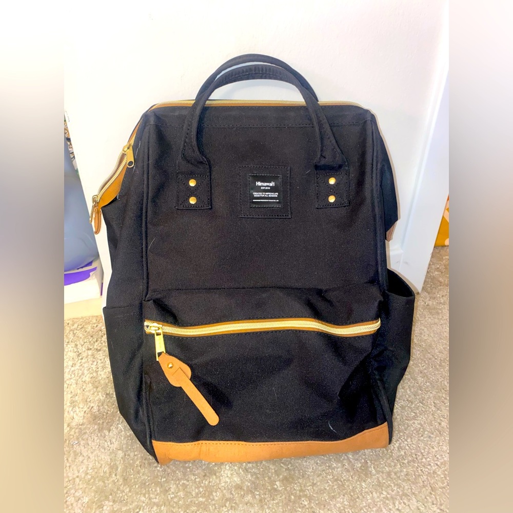 Himawari Backpack/tote, only used once! All zippers work.